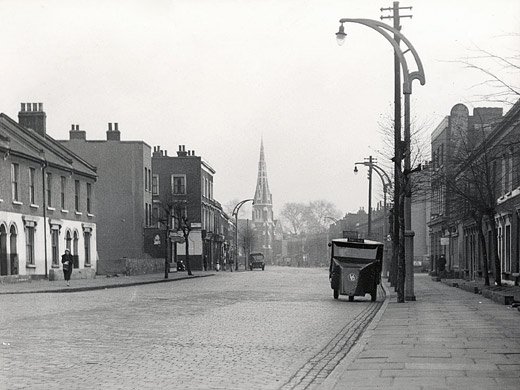 Manchester Road, Cubitt Town, Isle of Dogs. Looking North towards Christ Church. Circa 1954